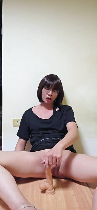Shemale Ting Xuan Masturbates While Riding a Giant Dildo