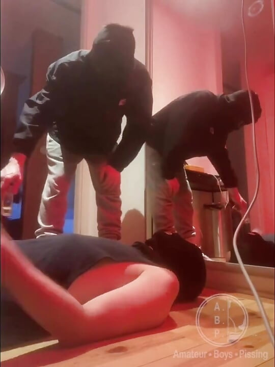 Amateur Boy Pissing in a Glass Held in His Friend's Mouth