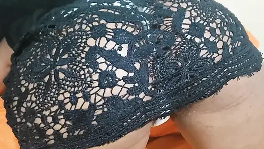 A Woman in a Black Dress at the Hotel with Her Panties Teasing Her Butt