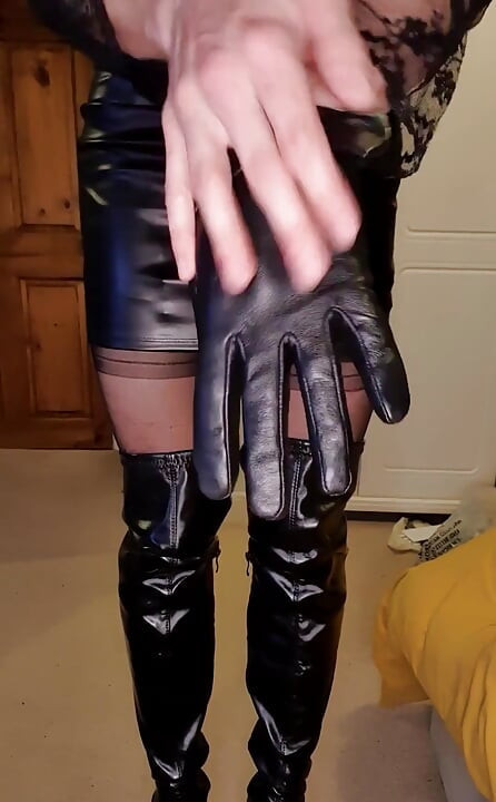 Dressed up in a tight leather mini skirt and slipping into my thigh high leather boots  Let me know if you have a boot fetish