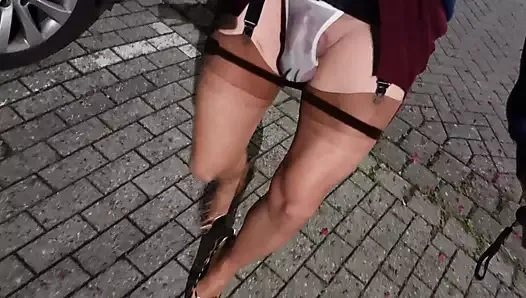 Sissy pees her micro thong in the parking lot with real nylons and skyheels