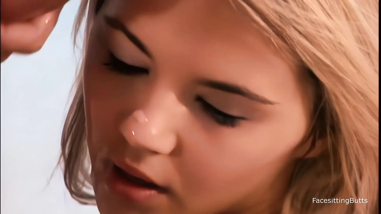 The blonde individual, with a voluptuous physique and a well-defined breasts, is committing herself to a male partner.