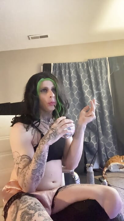 Sexy crossdresser smokes