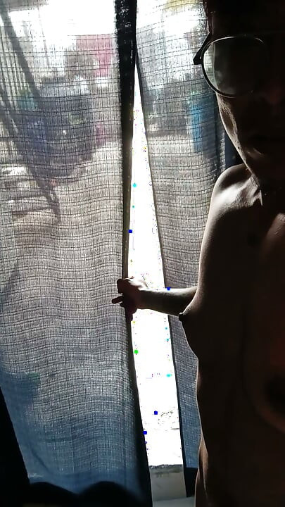 Caressing my cock with the vibrator