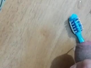 Cum at her toothbrush