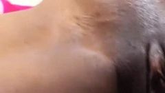 Upclose clean shaven black girl pussy play