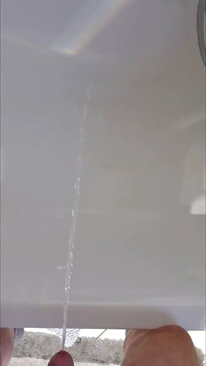 Peeing in the bathtub for almost 2 minutes