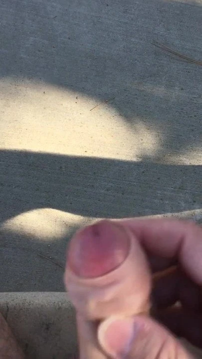 Masturbating outside and cumming on the ground