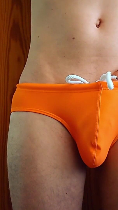 growing bulge in orange swim trunk - what every boy fears and girls dreaming of | Clip 1