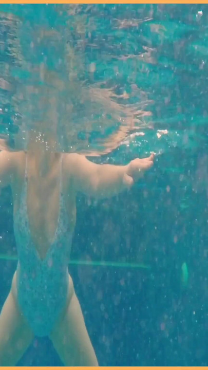 Memorable moment from "Wifey stuns everyone in amazing hot one piece bathers and flashes her perfect tits."