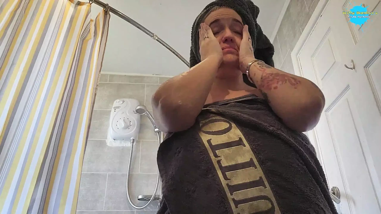 Topless housewife getting ready