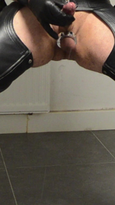 Leatherstudx in very tight leatherchaps, tattooed and pierced!