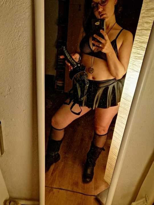 Femdom Mistress with strap-on