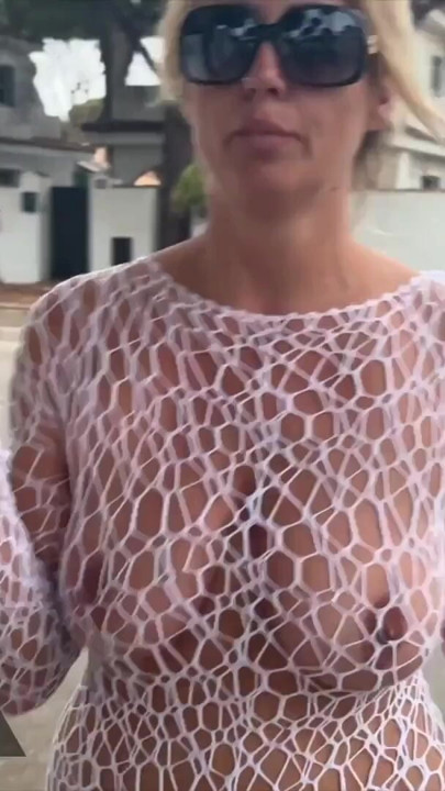 Alicia smokes a cigarette in a see-through dress in public | Clip 2