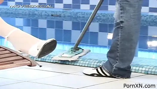 Sexy brunette pissed by pool boy