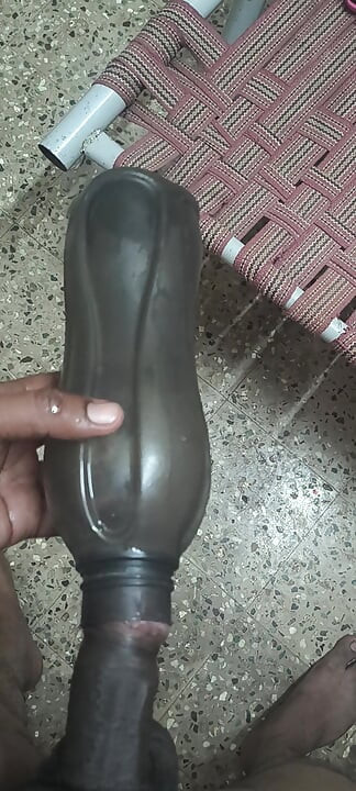 Indian Man Inside The Water Bottle Enjoys Sunni
