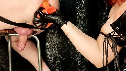 Mistress trains a slave's ass with huge dildos and feet.