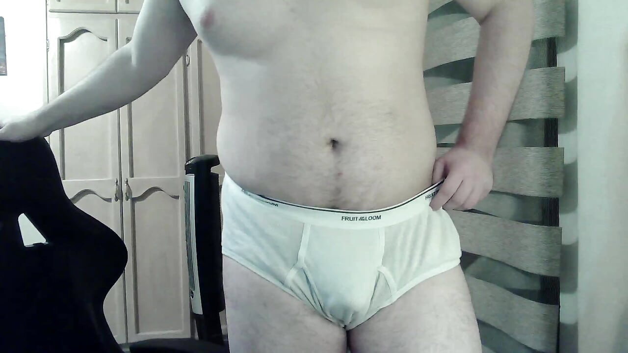 Hot beefy camboy shows off the goods during a show