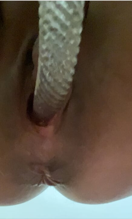 Using glass dildo in pussy close up