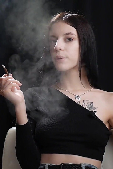 Slim Chick Is Smoking One Red