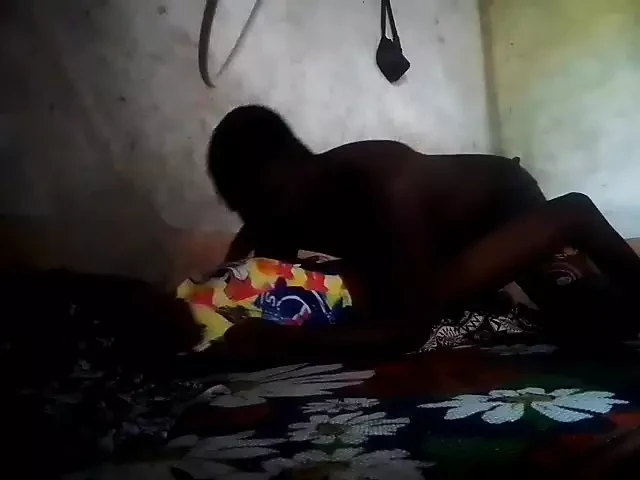 Two villagers get wet at night