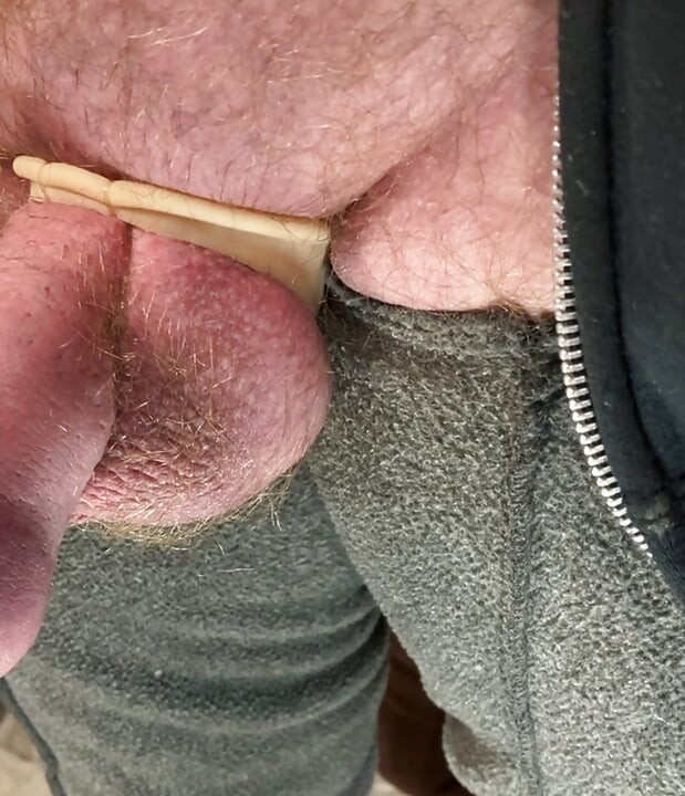 Up close cock and balls.  Uncut veiny dick.