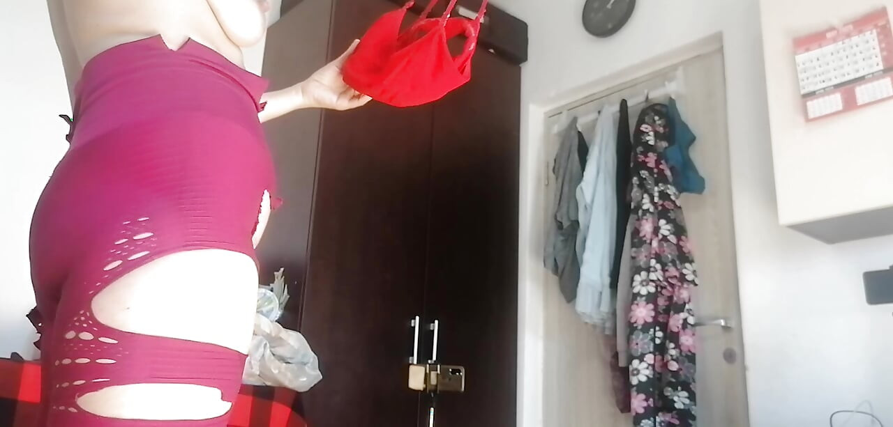 Amateur wife has fun trying on clothes and cutting them. Amateur wife sucking naked in the house