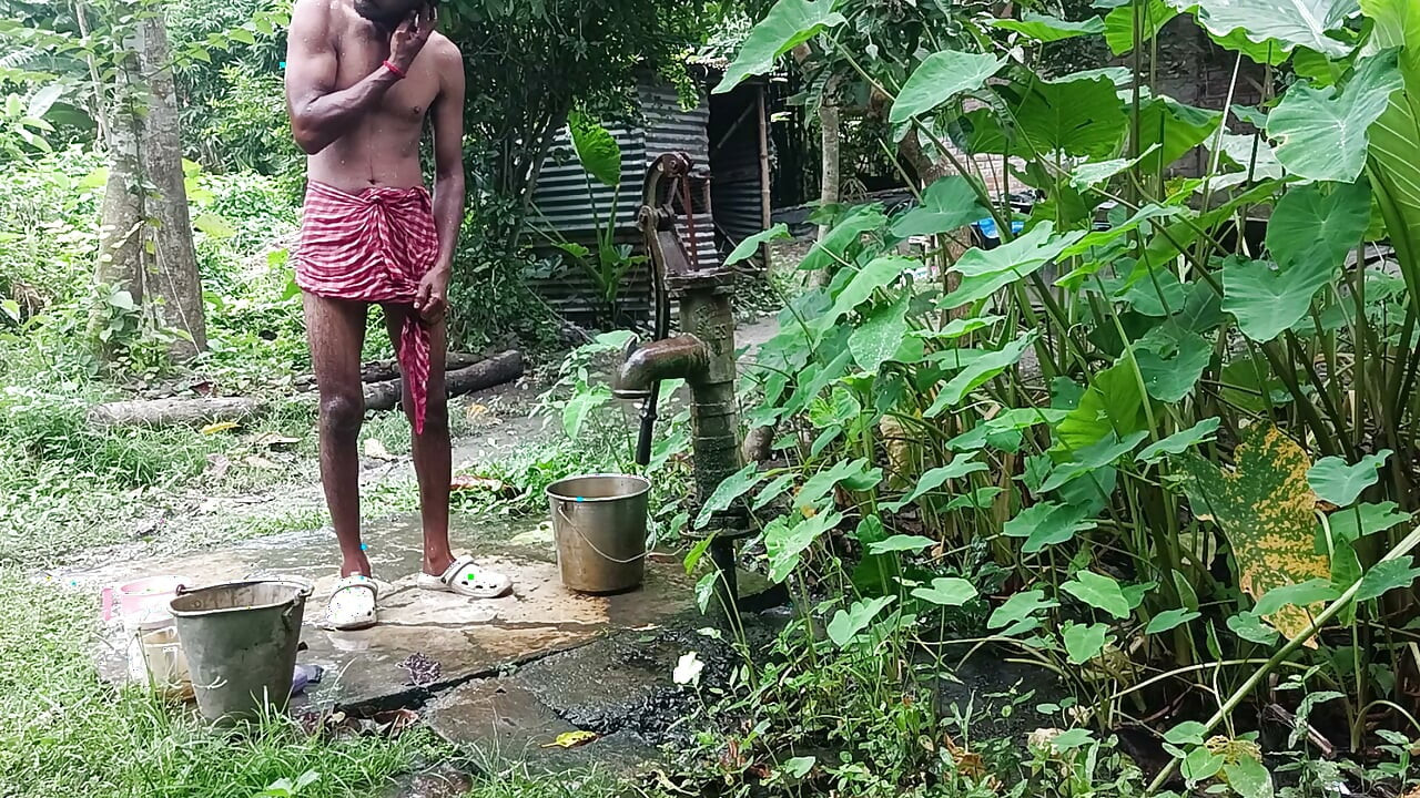 Tha naked Indian mature man shower in open place and showing body and dick..