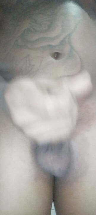 Tattooed brunette with 23cm of cock