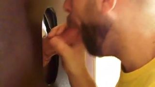 Hot sucking action at the homemade glory hole 5
