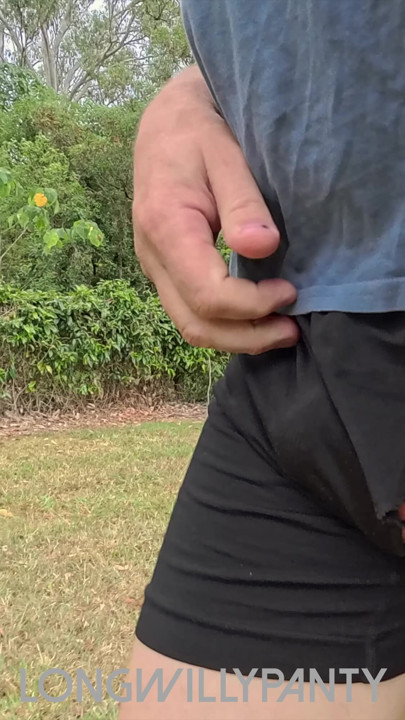 Straight amateur guy walks with dick poking out of exposed shorts