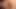 Seksi genç lezbiyenler birbirleriyle deney yapıyor, kanepede vibratör