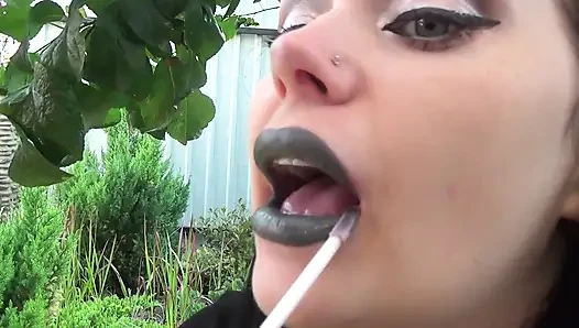 Covering Alex with khaki shiny lipstick kisses all over his face outdoor! + Little tongue play!