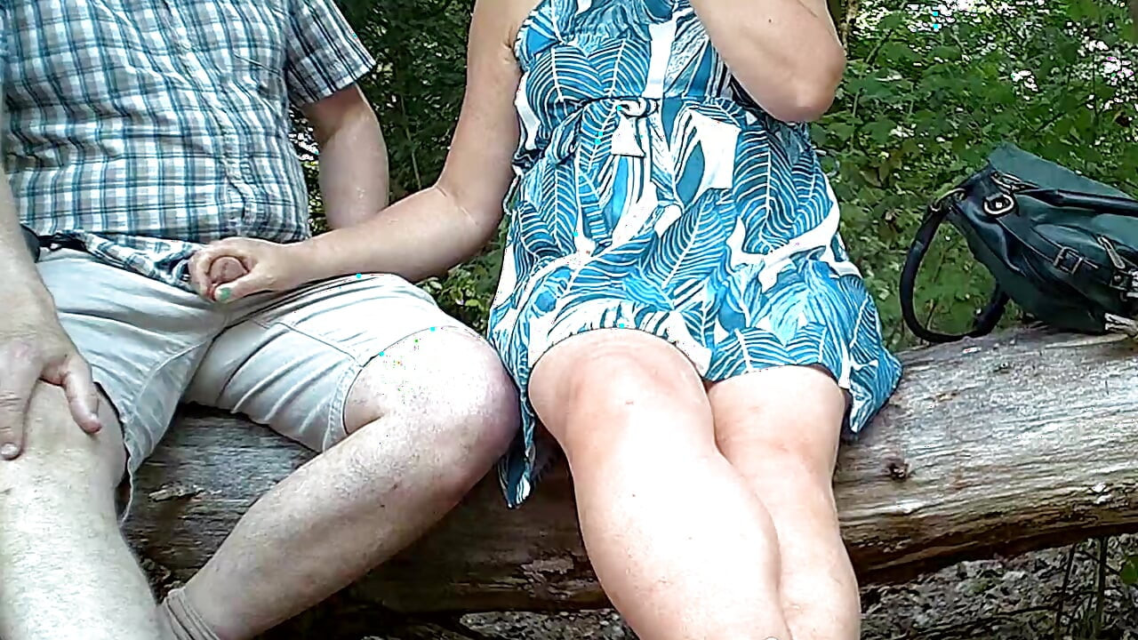 Handjob outdoors in the park in hot weather