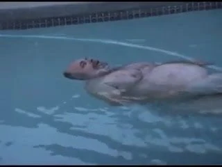 Santa relaxes in the pool