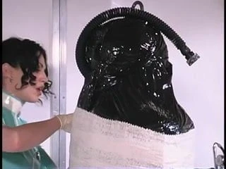 Sexy brunette covered in rubber