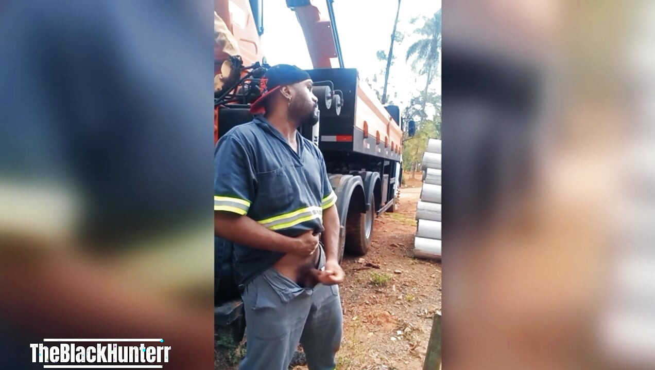 Worker Masturbating at the Construction Site Hidden Behind the Company Truck