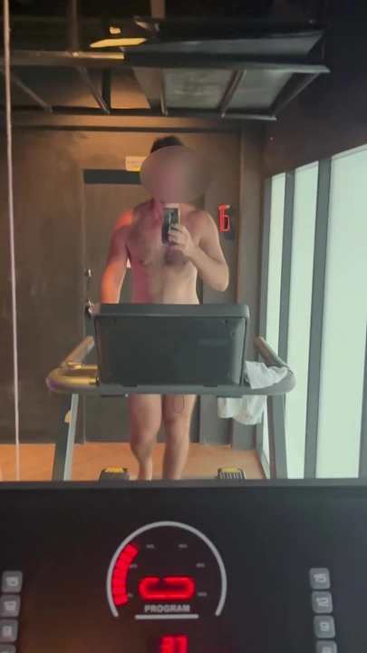 Naked on the treadmil in a gay sauna gym in Thailand.