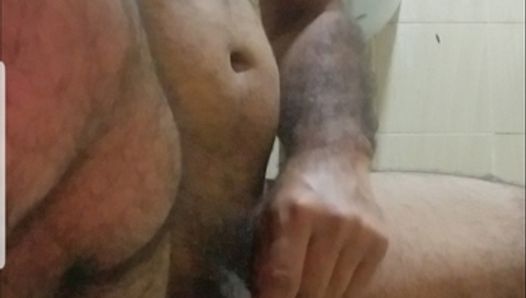 Slim daddy peeing and playing with cock