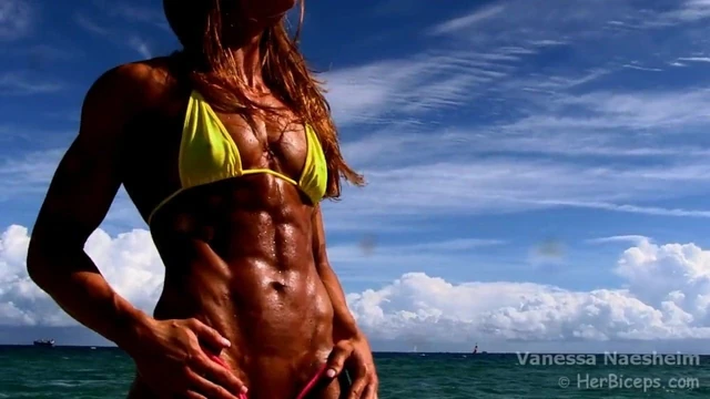 sexy tanned woman’s abs