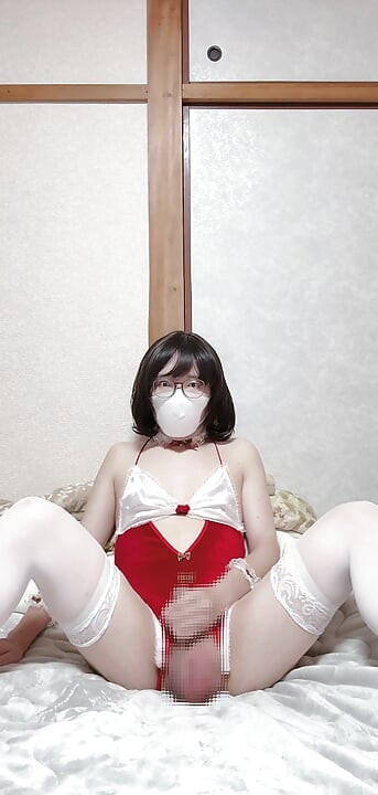 A femboy Santa masturbating