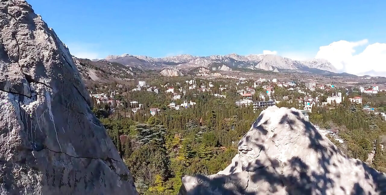 Outdoor Erotica, a Girl with a Stunning Figure Shows Her Magnificent Ass Against the Backdrop of the Sea and Mountains.