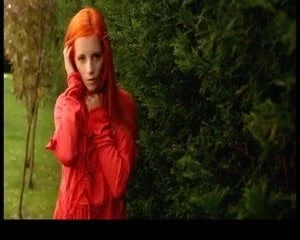 Orange haired beauty rubs herself