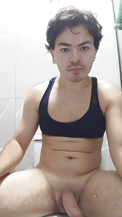 gay femboy sexy skirt lingerie and licking lollipop