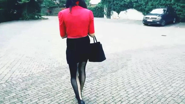 Tgirl walking around on a parking...