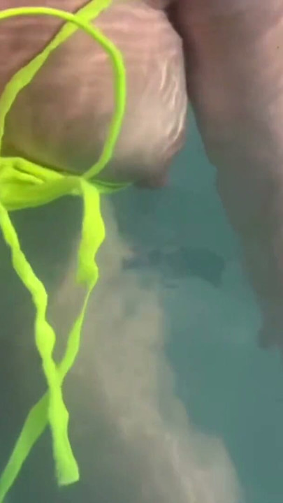 Artemisia Love flashing her juicy big tits underwater for you wearing a sexy bikini | Clip 1