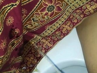 Pissing on mother in law lungi