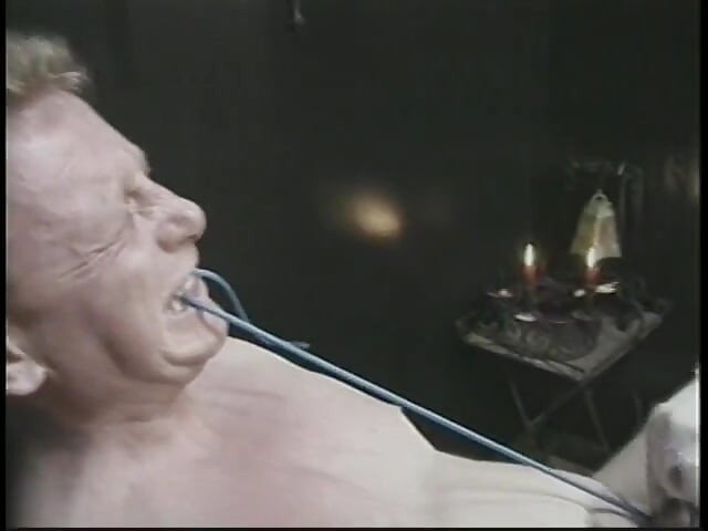 Bound man is subdued with strange penis remedy by two chicks in dungeon