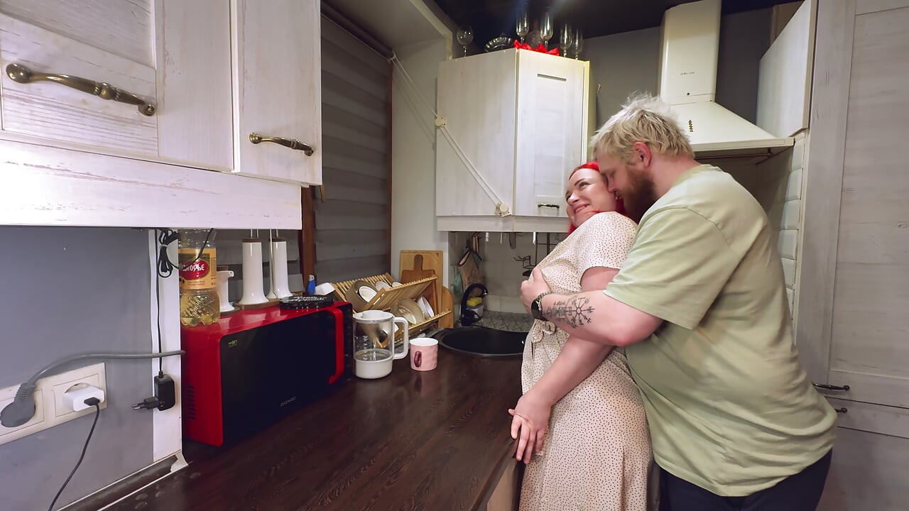 Sex in the kitchen with a red-haired wife. .