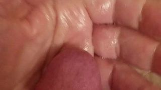 HTM playing with a hand full of cum